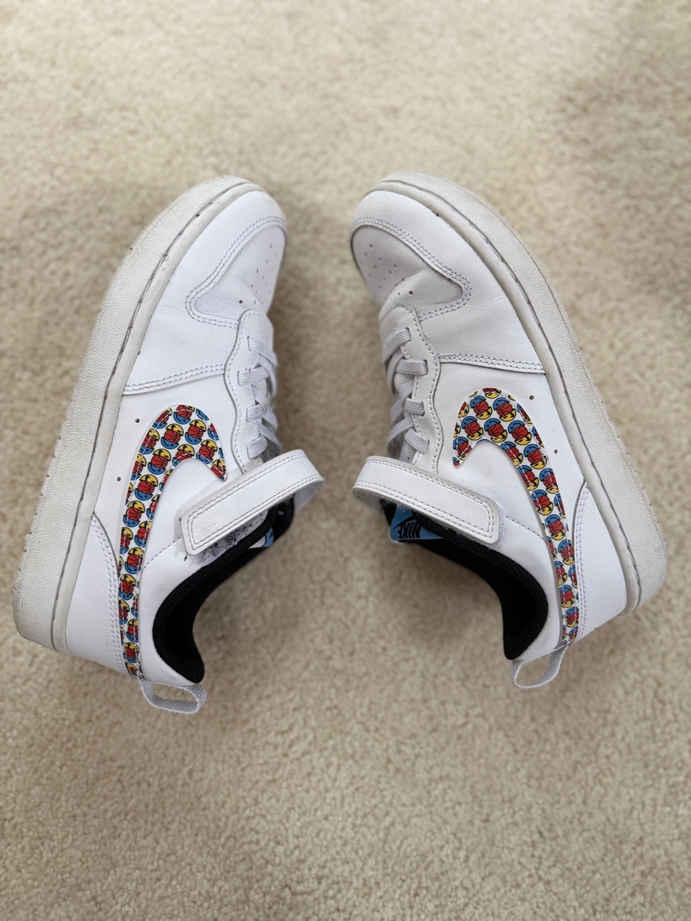Nike Kids White Sneakers with Multicolor Patterned Swoosh